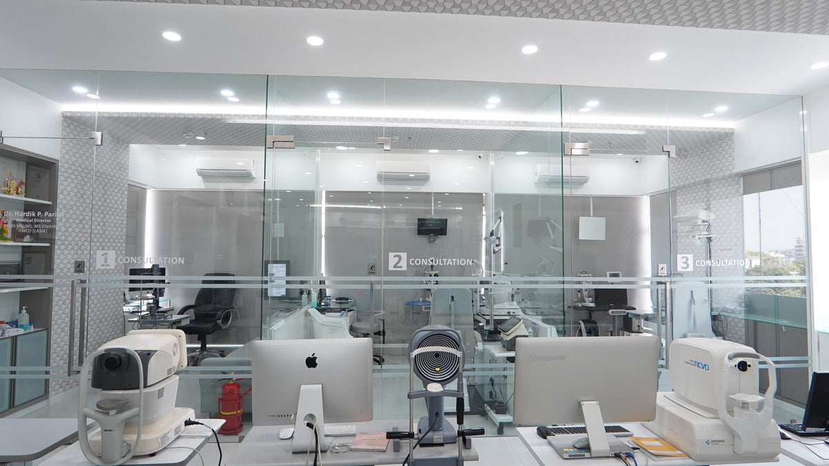 Global Eye Clinic diagnostic hall with ophthalmic testing equipment